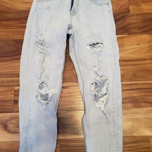 light blue ripped mom jeans.